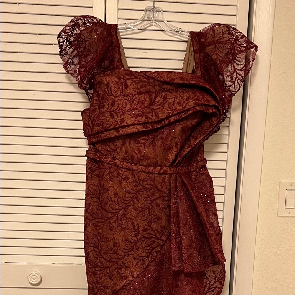 Evening couture gown brand new never worn. Size 12.